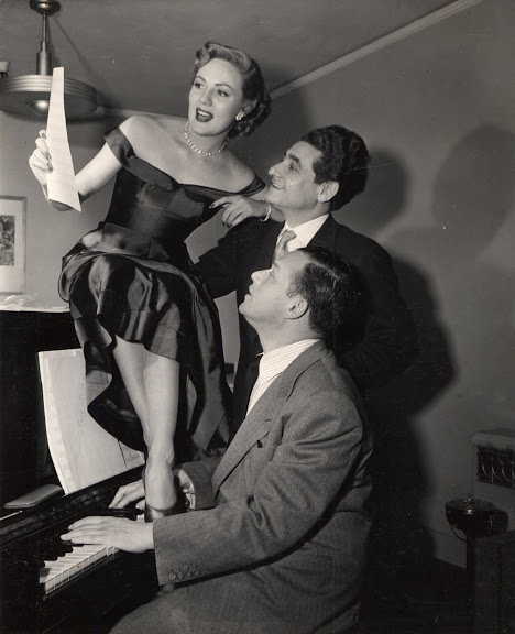 Rehearsing in the studio around the piano in 1951 for Two Tickets to Broadway. Clockwise: film actress Barbara Lawrence, Leo Robin and Jule Styne at the piano.