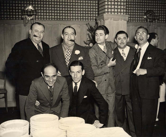 An impressive congregation of songwriters at Hollywood’s famed Trocadero nightclub on the Sunset Strip in 1938. Front row from left to right: Lorenz Hart and Hoagy Carmichael. Back row from left to right: Al Dubin, Mack Gordon, Leo Robin, Harry Revel and Harry Warren.
