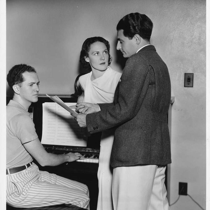 Leo Robin and Ralph Rainger with singer-actress Kitty Carlisle rehearsing the song 