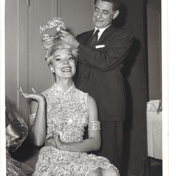 And the winner is -- Leo Robin crowns the diamond tiara on Princess Carol Channing during the tremendous run of the Broadway smash hit Gentlemen Prefer Blondes