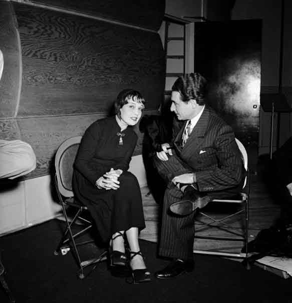 Lyricist Leo Robin with famed author Anita Loos who wrote the 1925 best seller Gentlemen Prefer Blondes. She along with Joseph Fields wrote the script for the 1949 musical. It opened on Broadway at the Ziegfeld Theatre where it ran for 740 performances. Jule Styne and Leo Robin wrote the score.